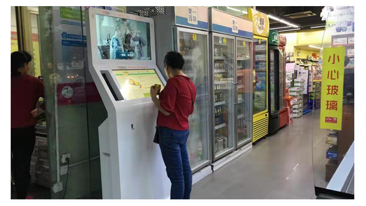 What are the main uses of touch inquiry machines in supermarkets?